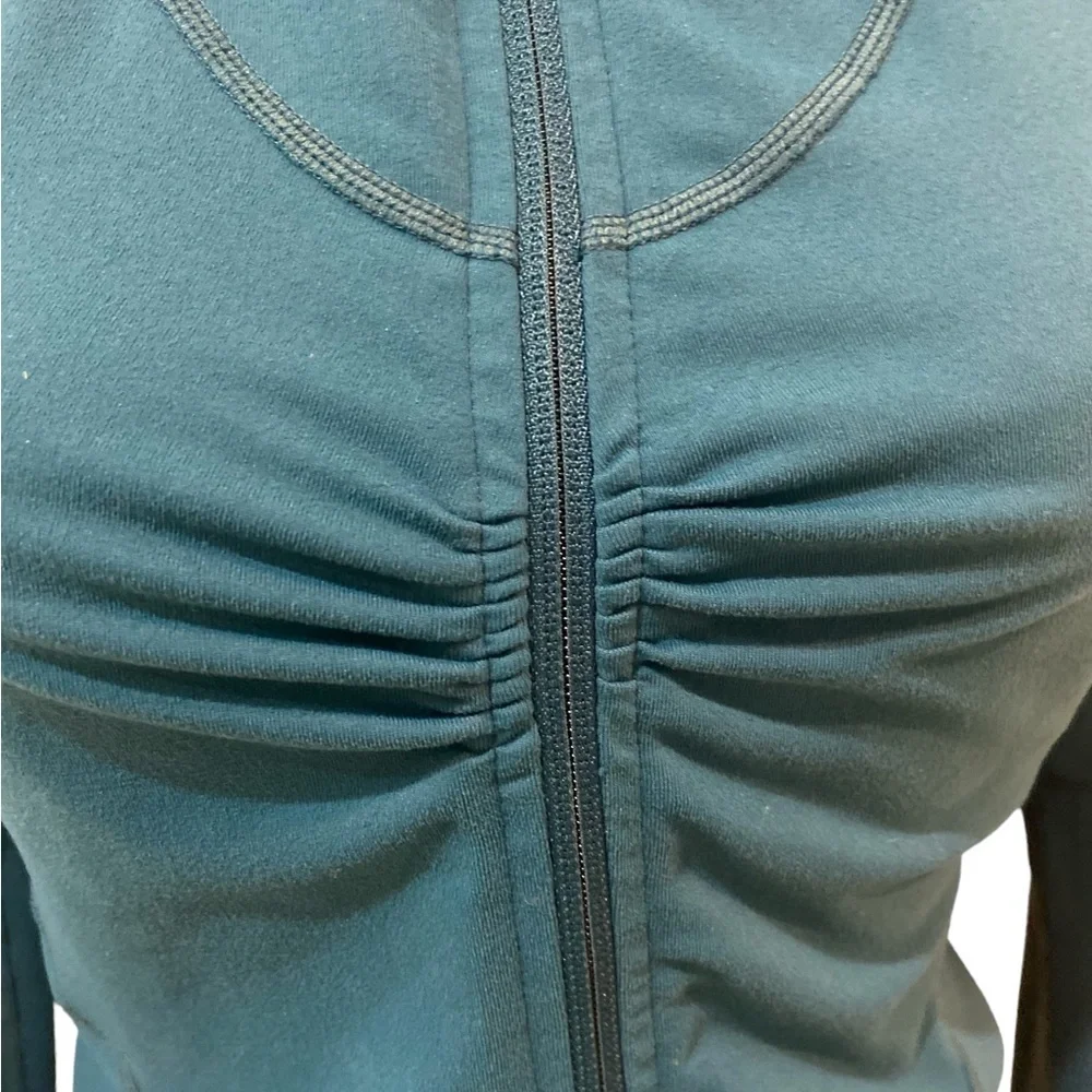 Zella zip up teal ruched athletic jacket with zip up pockets & ruffle back small
